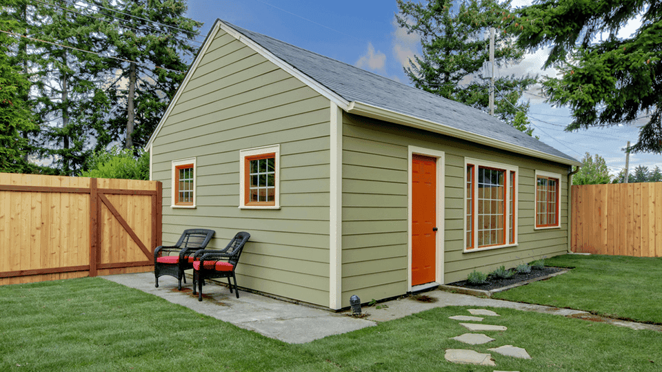 green accessory dwelling unit in backyard