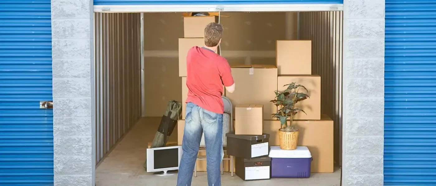standing outside a storage unit with boxes